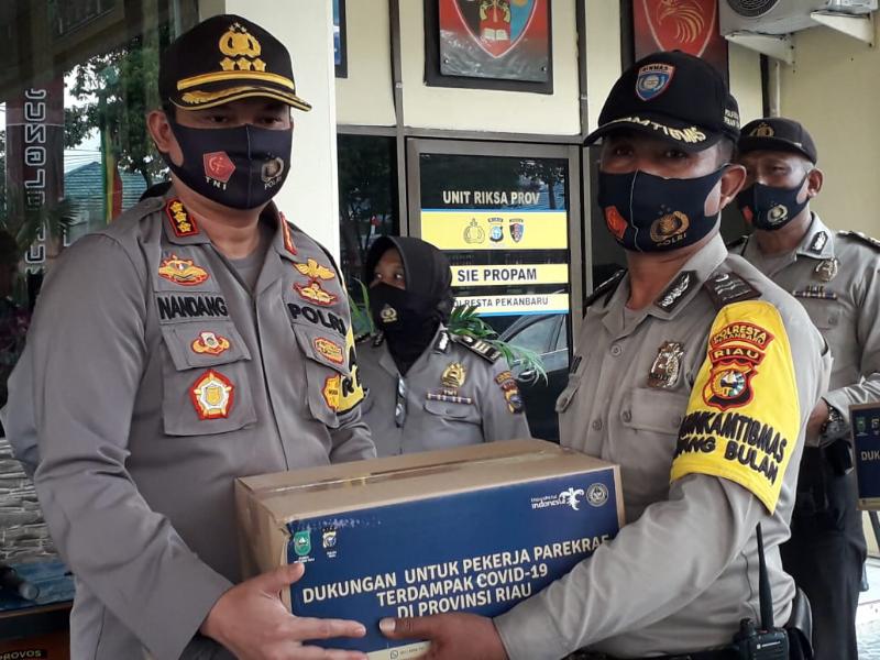 Polresta Pekanbaru Salurkan 4039 Paket Sembako dari Kementrian Pariwisata RI