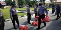 Polres Kampar Bagikan 300 Paket Sembako dan Bibit Tananam